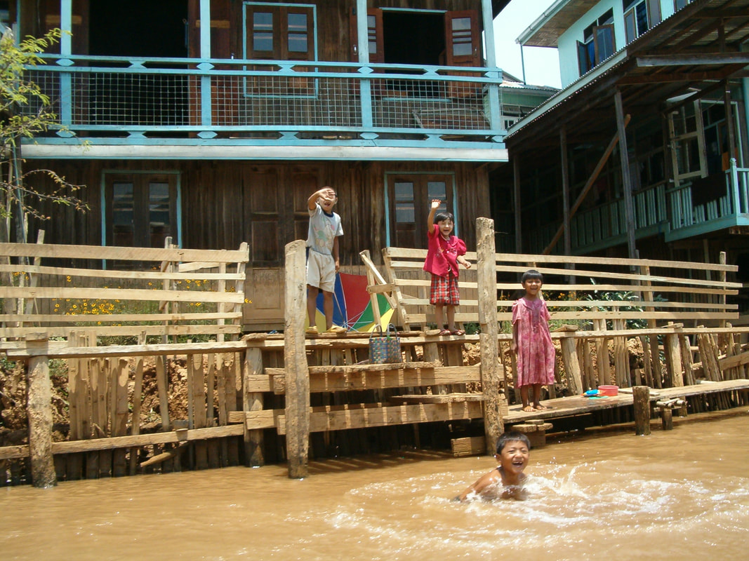 Children Waving in Myanmar